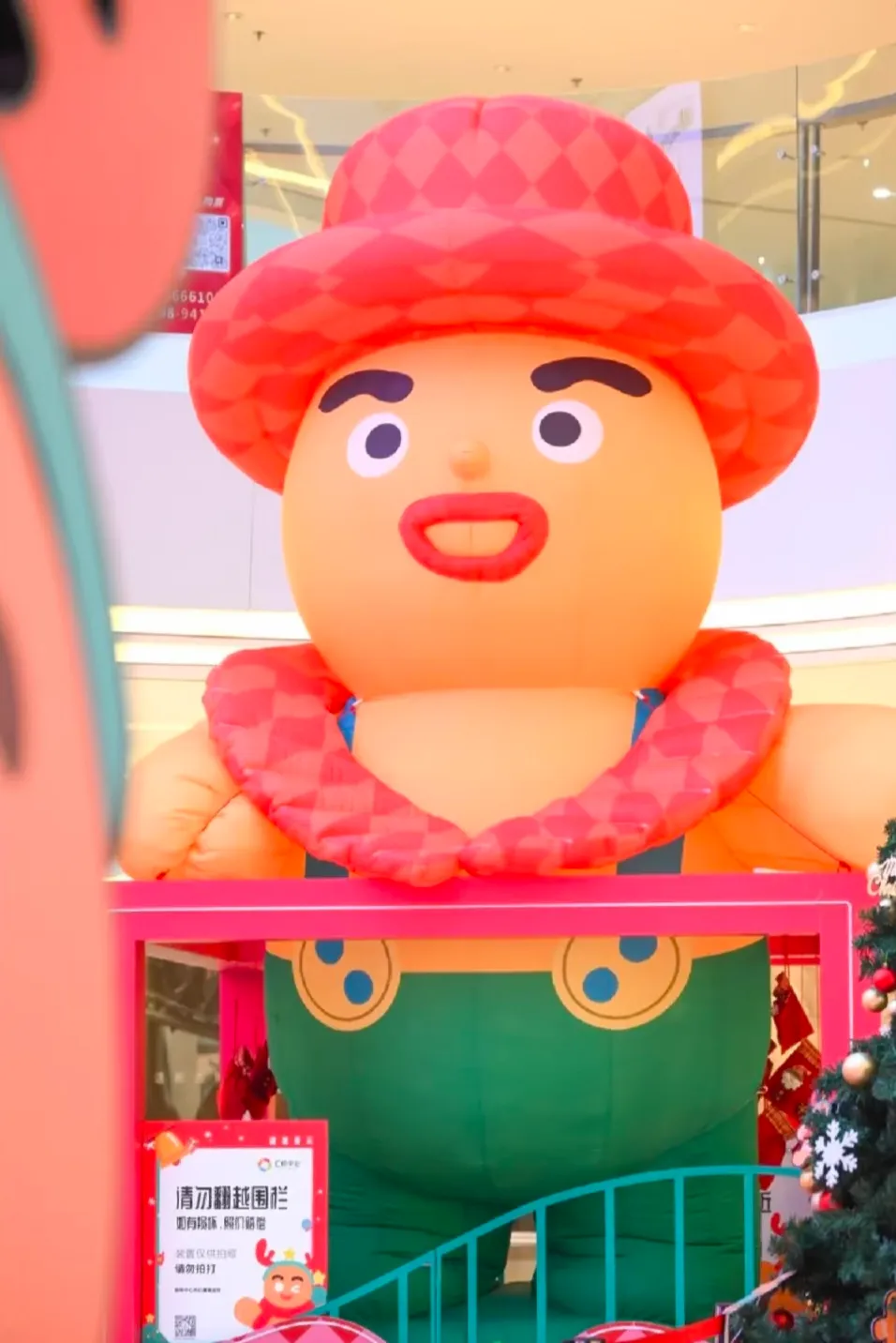 Grand Mall Atrium Christmas Theme Installation – Whimsical Pop-Art Candy Cabin Set with Towering Candy-Cane Chimney & Neon Archway