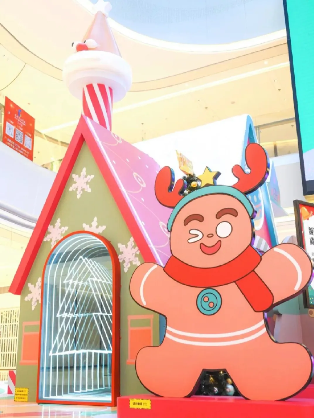 Grand Mall Atrium Christmas Theme Installation – Whimsical Pop-Art Candy Cabin Set with Towering Candy-Cane Chimney & Neon Archway